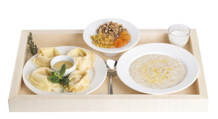 Russian pancakes with oatmeal and dried fruits.
