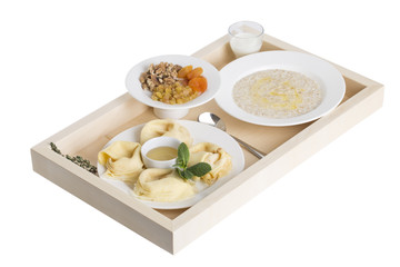 Russian pancakes with oatmeal and dried fruits.