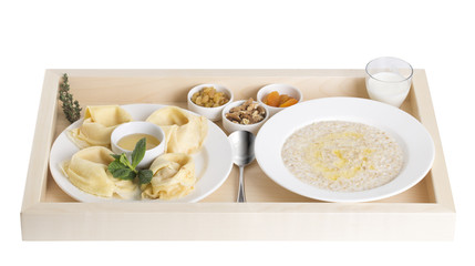 Russian pancakes with oatmeal and dried fruits.