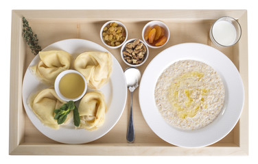 Russian pancakes with oatmeal and dried fruits.