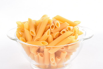 Pasta on a white background. Products from flour. Pasta of Italian origin.