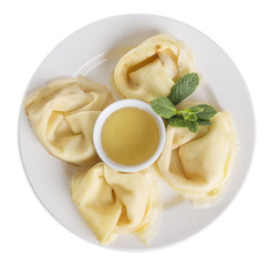 Russian pancakes with honey.