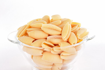 Pasta on a white background. Products from flour. Pasta of Italian origin.