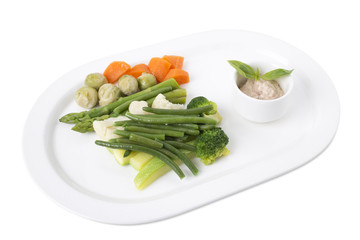 Delicious steamed vegetables with tofu sauce.