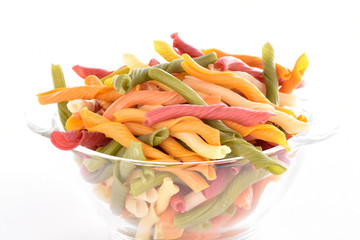 Pasta on a white background. Products from flour. Pasta of Italian origin.