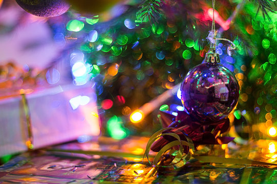 Christmas and New Year Decoration. Bauble on Christmas Tree