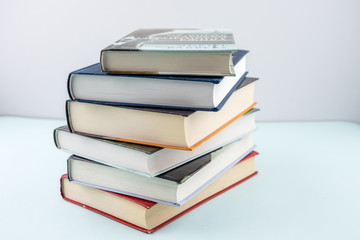 Education concept - books on the gray background 