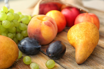 Fresh fruits on wooden table