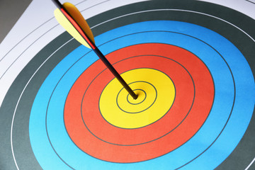 Arrow in the center of target for archery, closeup