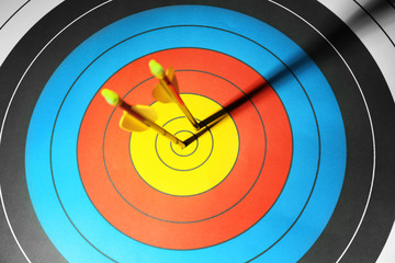 Arrows in the center of target for archery, closeup