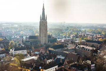 Obraz premium Brugge, Belgium - November, 2017. Aerial Brugge medieval historic city. Brugge streets and historic center, canals and buildings. Brugge popular touristic destination of Belgium.