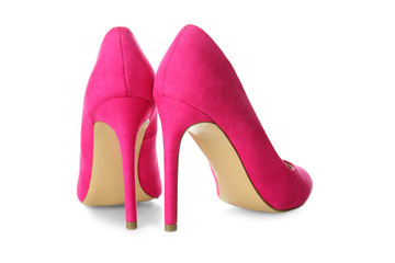 Pair of classic female shoes on white background