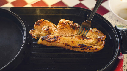 Roast pork on electric pan