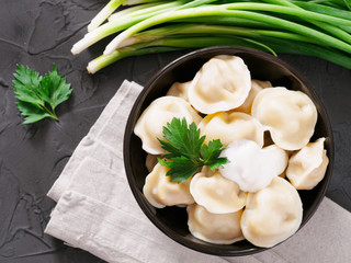 Russian pelmeni, ravioli, dumplings with meat