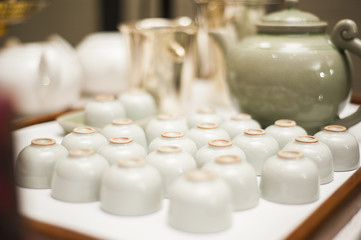 Set of ceramic cup and tea pot in chinese traditional style