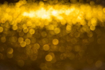 Gold bokeh background, glitter abstract,Christmas lights