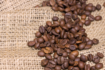 Roasted coffee beans on linnen cloth