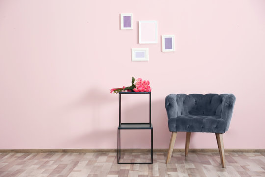 Modern Interior With Armchair On Pink Wall Background