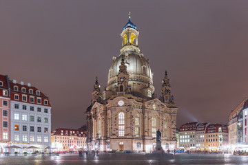 Fototapeta na wymiar Lutheran church of Our Lady aka Frauenkirche with market place at night in Dresden, Saxony, Germany