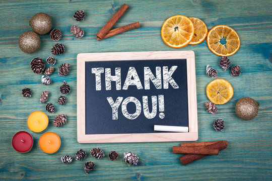 Thank You. Christmas and holiday background. Ornaments and decor on a wooden table.