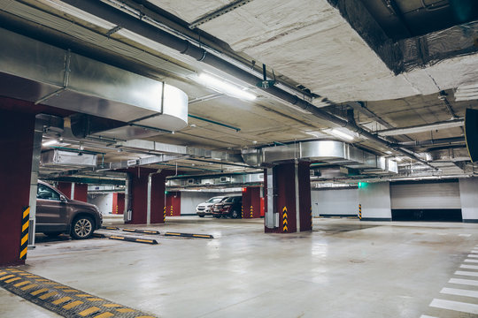 Underground garage or modern car parking,  industrial interior