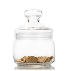 Fototapeta na wymiar Few coins in glass jar with lid isolated on white