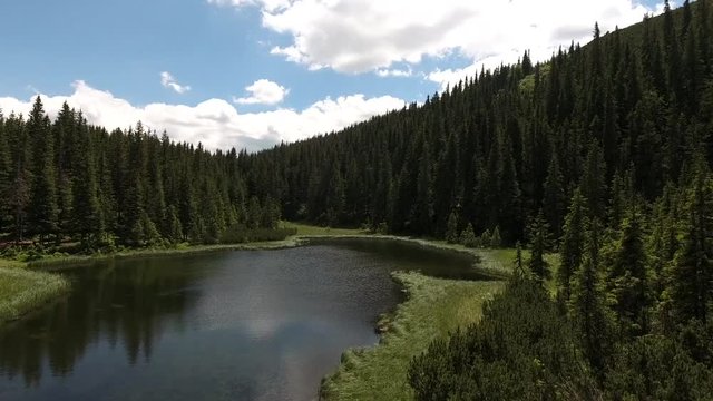 Beautiful mountain lake Maricheika in the Ukrainian Carpathians. Summer sunny day. Ukrainian nature of the beautiful places of the country. Buffer zone.