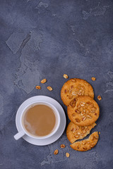 Obraz na płótnie Canvas Coffee with milk and peanut cookies