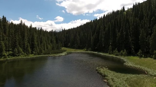 Beautiful mountain lake Maricheika in the Ukrainian Carpathians. Summer sunny day. Ukrainian nature of the beautiful places of the country. Buffer zone.