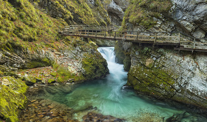 wooden bridge in canyon through big creek in Slovenia