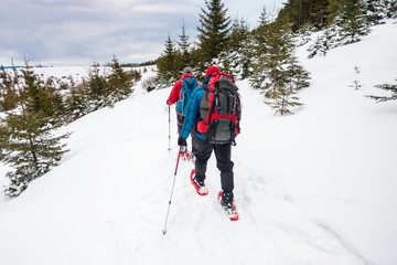 Two climbers in the winter.