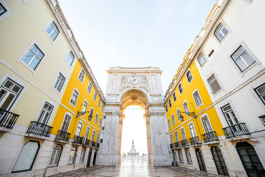 View on the Triumphal arch on the Commerce square during the sunrise in Lisbon city, Portugal