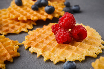 Round belgium waffles with berries