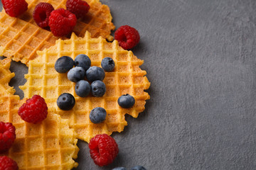 Round belgium waffles with berries