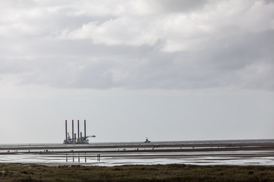 Tuc with the construction platform in the north sea