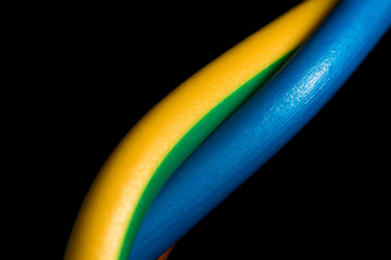 Multicolored wire macro isolated on black background