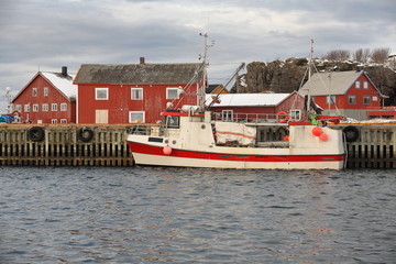 Fishing boat painted white-red moored in the port. Laukvik-Vagan kommune-Austvagoya-Lofoten-Norway.0625