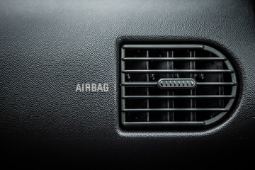 Car air ventilation. Airbag text next to it
