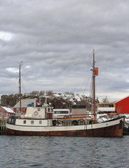 Fototapeta na wymiar Old wooden fishing boat moored in the port-Laukvik-Vagan kommune-Austvagoya-Lofoten-Norway. 0631