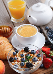 Fresh crusty croissants and muesli for morning meals
