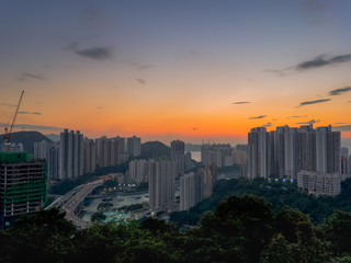 Fototapeta premium Stunning light of Sunset over Aberdeen And Ap Lei Chau district of Hong Kong