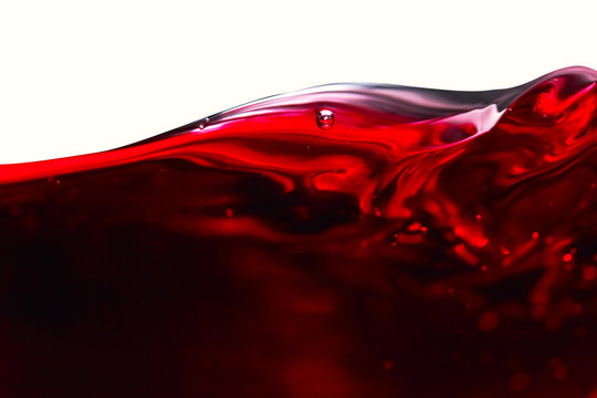 Fototapeta Red wine on white background