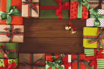 Fototapeta na wymiar Lots of Gift boxes on wood, christmas presents in paper