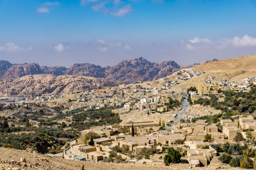 Fototapeta na wymiar Overlook of Petra, Jordan with mountians in the background
