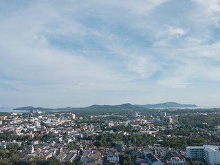 cloudy blue sky background and cityscape from the viewpoint on hilltop