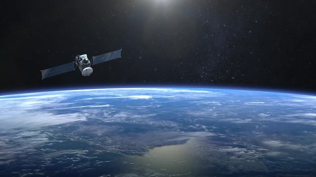 The satellite scan and monitor the Earth. The satellite is slowly approaching. The earth rotates slowly. 4K.