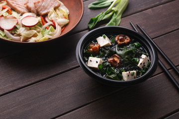 Miso soup with tofu cheese, mushrooms and seew