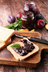 Fresh plum jam with toast or bread for breakfast.