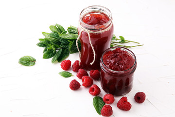 Fresh raspberry jam with toast or bread for breakfast