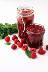 Fresh raspberry jam with toast or bread for breakfast